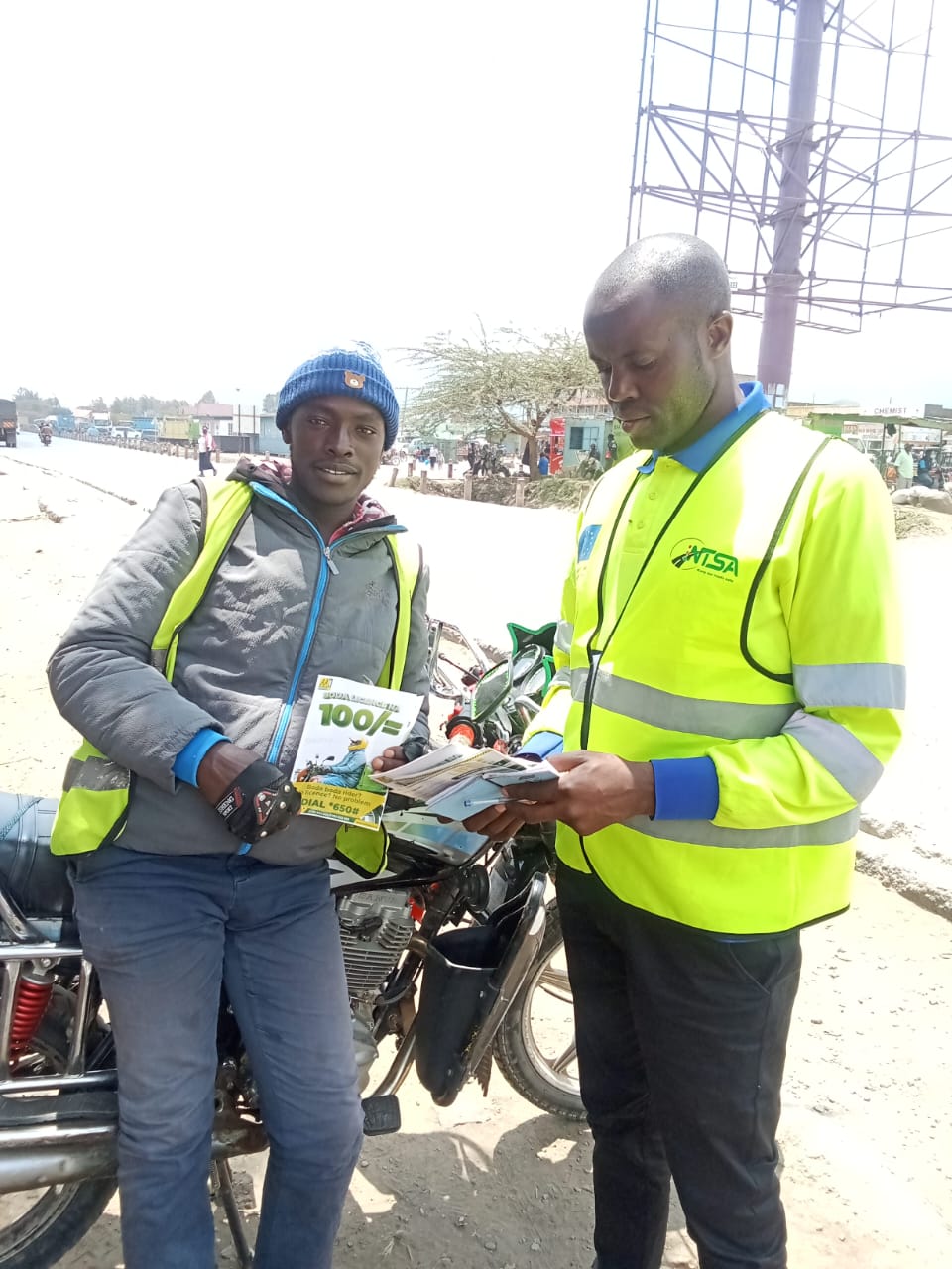 Road safety champions sharing educational materials